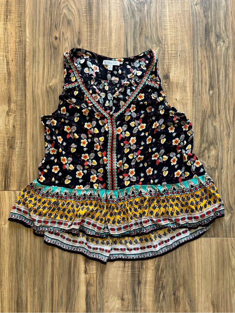Patrons of Peace floral peplum high-low tank crochet details ruffle hem Size M.